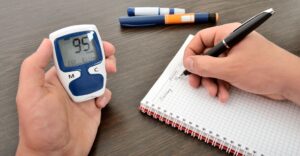 A man testing his glucose level