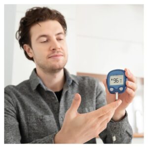 a man checking his blood sugar levels