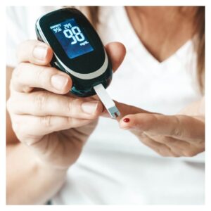 a women checking her blood sugar levels