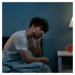 a man stressed out in bed