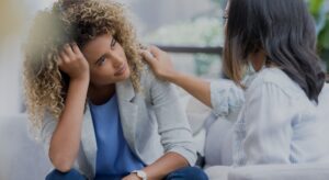 person comforting friend