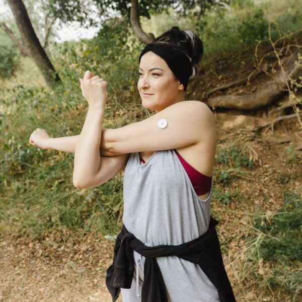 girl working out with cgm