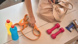 Person packing a gym bag