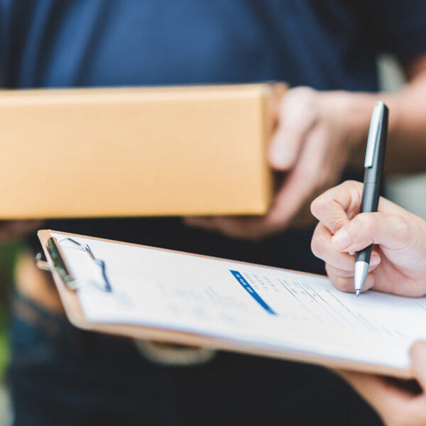 signing off on paperwork for a package