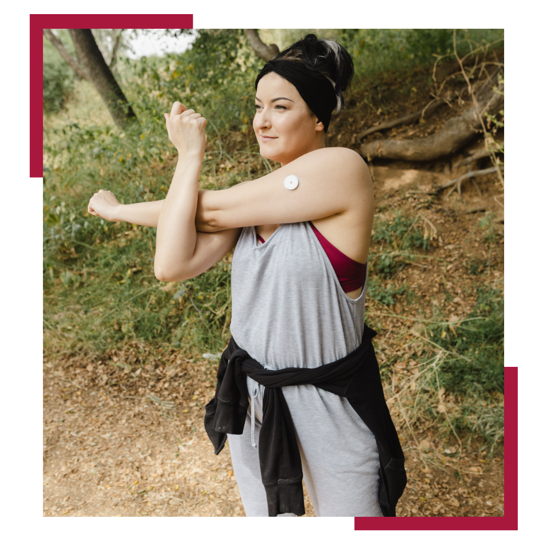 woman stretching with sensor on arm