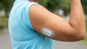 person wearing dexcom